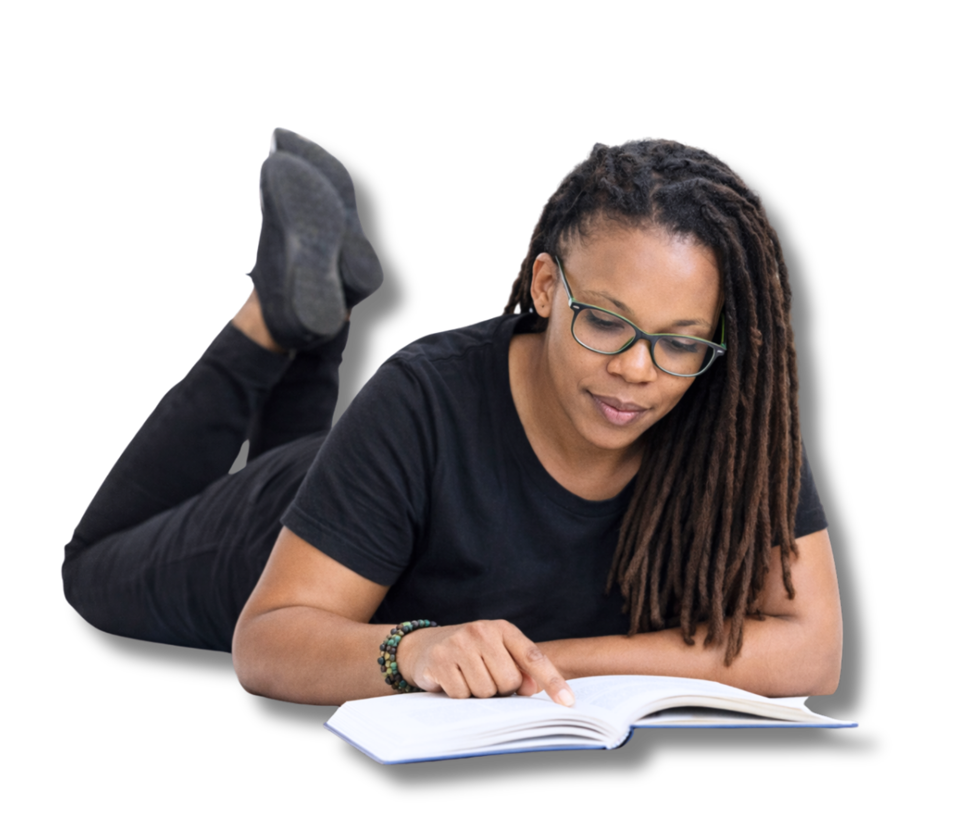 Academic coach lying down reading and preparing postgraduate coaching sessions